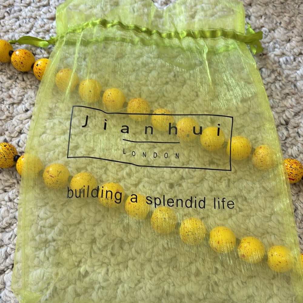 Jianhui/London. Yellow Beaded Necklace 52” circumference. New.